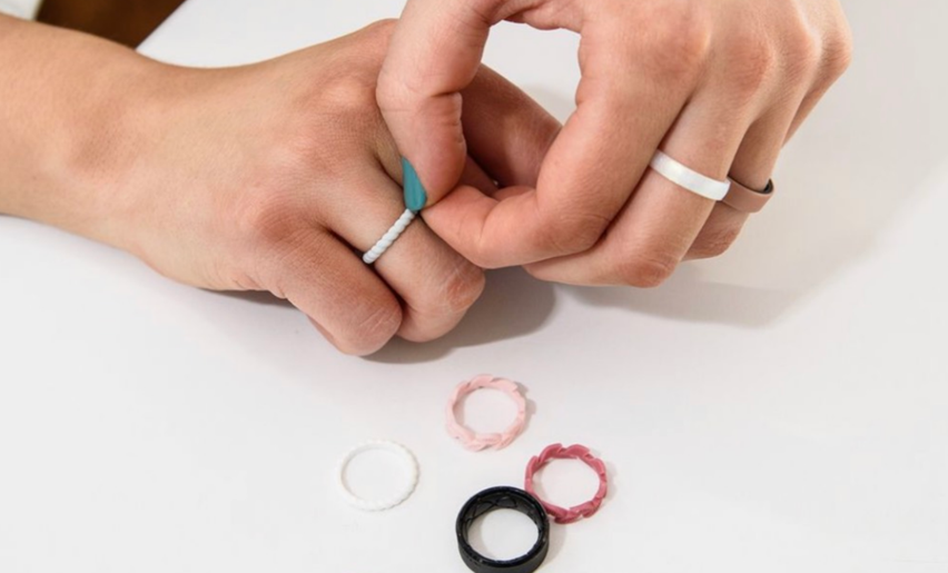 Colorful silicone rings on hand
