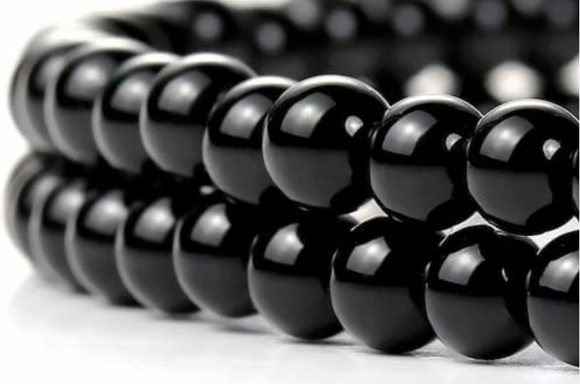 black  bead  bracelet  meaning
