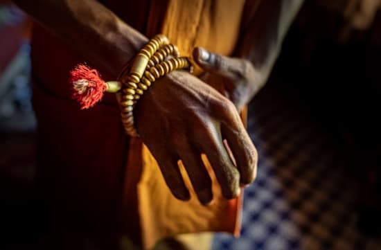 monk wearing bracelet