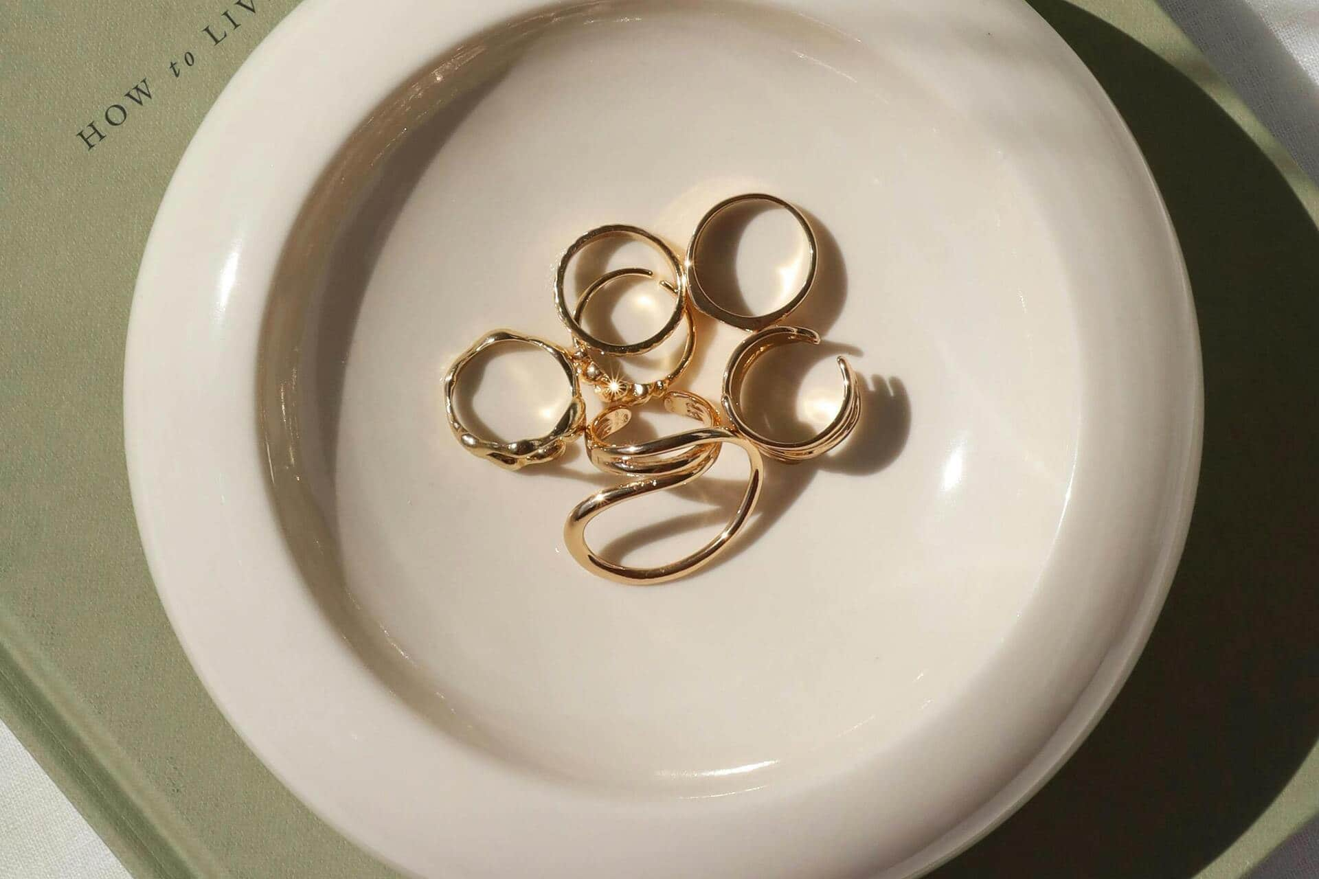 14k rings on a ceramic plate