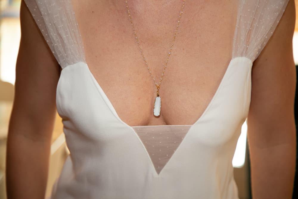 mum wearing breast milk necklace