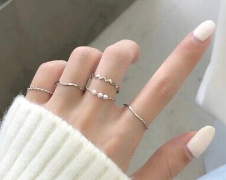 silver rings with white clothes