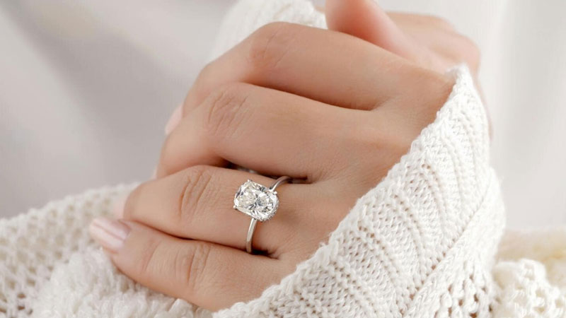 engagement ring on ring finger